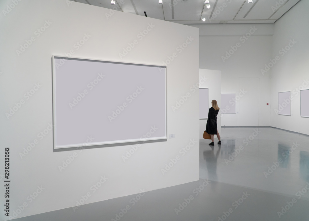 exhibition room of the gallery with blank pictures and people exhibition room of the gallery with blank pictures and people