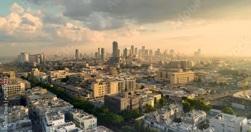 Tel Aviv Skyline from Drone. Aerial shot long super wide horizon view. DayTime Sunset or early morning Color Sky coastline and office building in a modern Tel Aviv