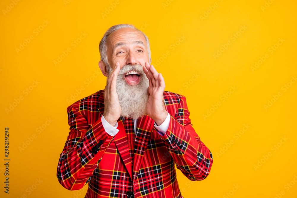 Close-up portrait of his he nice handsome attractive cheerful cheery glad gray-haired man saying rumor gossip hearsay advert isolated over bright vivid shine vibrant yellow color background - obrazy, fototapety, plakaty 