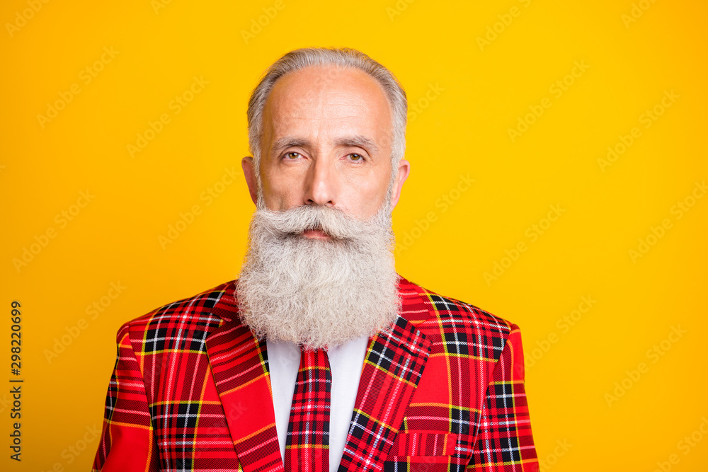 Close-up portrait of his he nice attractive serious imposing gray-haired man wearing checked blazer newyear party isolated over bright vivid shine vibrant yellow color background Close-up portrait of his he nice attractive serious imposing gray-haired man wearing checked blazer newyear party isolated over bright vivid shine vibrant yellow color background