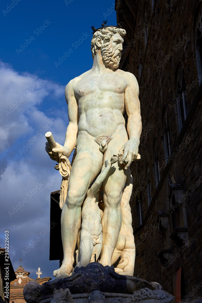 The figure of Neptune is a fragment of the fountain of Neptune on Signoria Square The figure of Neptune is a fragment of the fountain of Neptune on Signoria Square