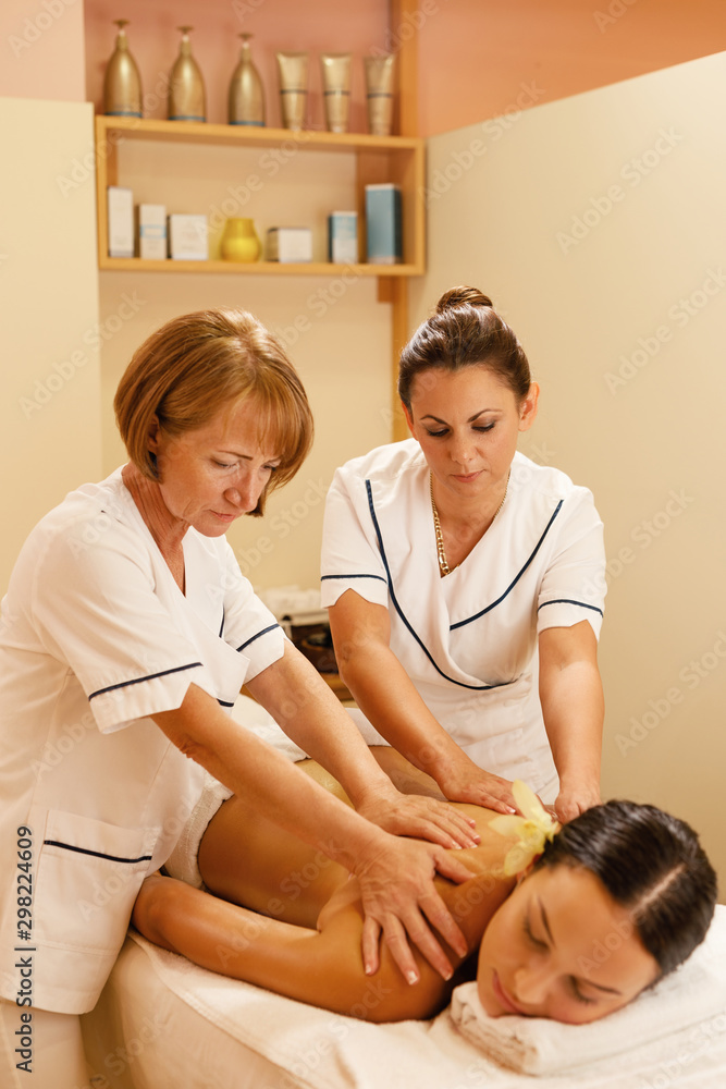 Fototapeta premium Four hands spa treatment!