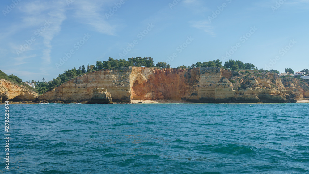 View from the Sea of the Cliffs of Algarve Coastline in the South Portugal, near Portimao