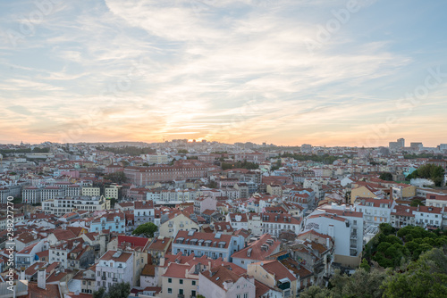 Sunset and Night view of Lisbon city from Miradouro da Graca