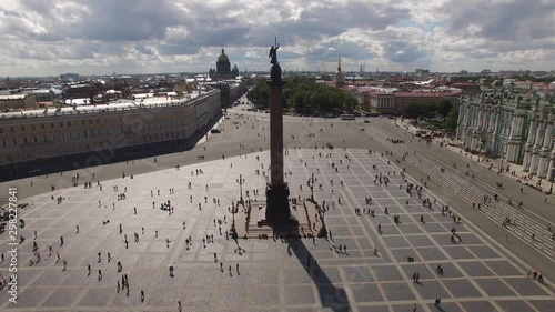 Palace Square from above aerial quadcopter flightover. Best Saint Petersburg drone footage. Winter palace hermitage museum facade. Alexander column with angel and cross.  photo