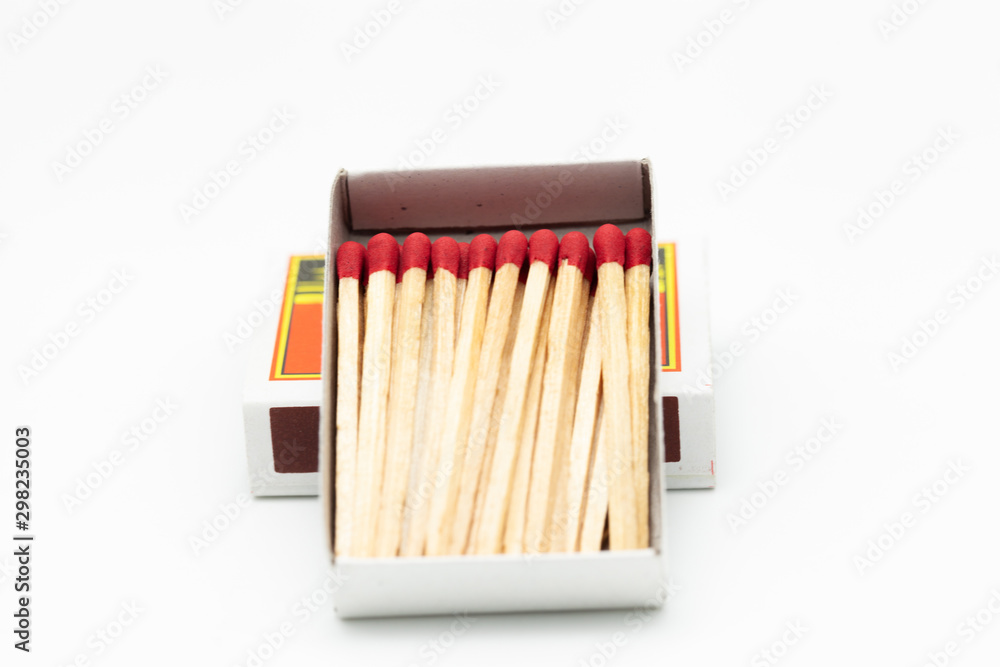 Obraz premium matchstick fire danger white isolated