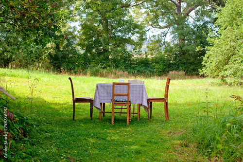 Picnic table and chairs in the garden.