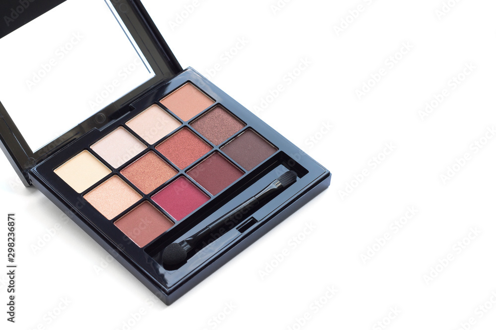 Palette of eyeshadows in brown tones, matte and shimmer eyeshadows isolated on white background, copy space. Autumn eyeshadow palette Palette of eyeshadows in brown tones, matte and shimmer eyeshadows isolated on white background, copy space. Autumn eyeshadow palette