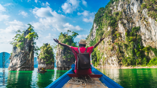 Panorama traveler man on boat joy fun amazed nature rock island adventure scenic landscape Khao Sok National park, Famous place tourist travel Thailand Tourism beautiful destination Asia vacation trip