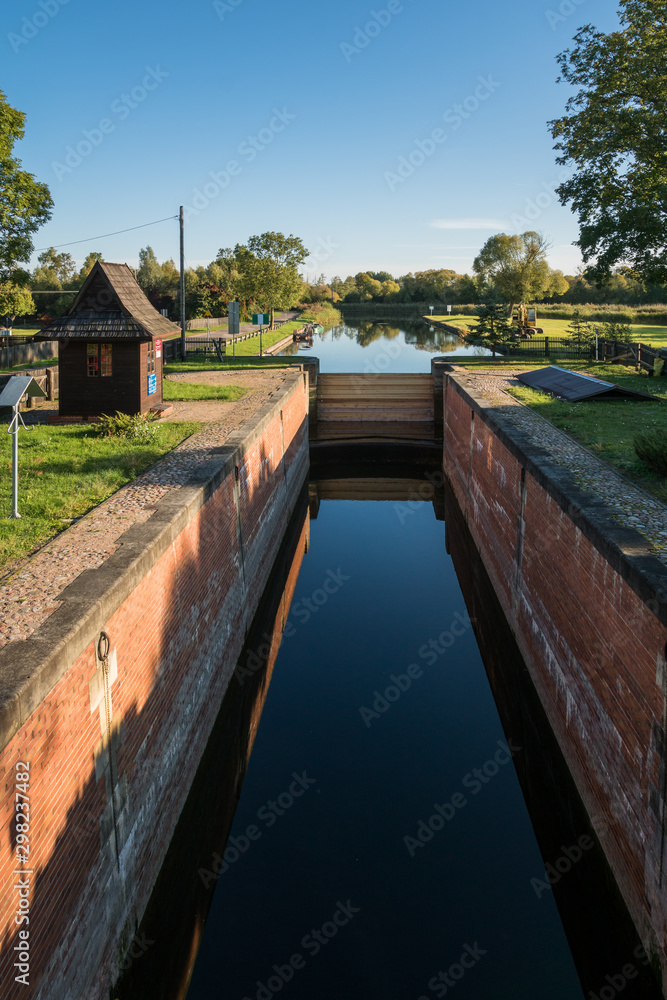 Fototapeta premium Historic lock on the Augostowski canal in Debowo, Podlaskie, Poland