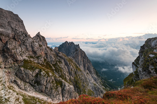 Dramatic Sunrise Above Clouds Level at High Mountains Peaks, Mangart, Slovenia