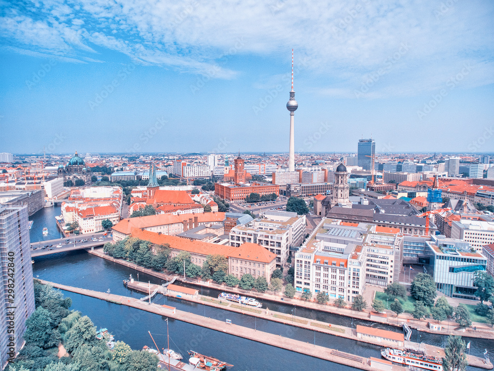 Fototapeta premium Berlin aerial view from drone, Germany. Buildings, tower and city river