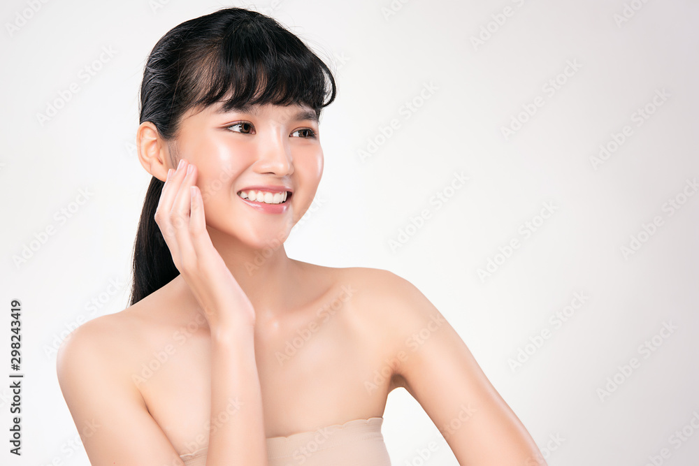 Beautiful young Asian woman touching soft cheek and smile with clean and fresh skin. Happiness and cheerful with, isolated on white background, Beauty and Cosmetics Concept, Beautiful young Asian woman touching soft cheek and smile with clean and fresh skin. Happiness and cheerful with, isolated on white background, Beauty and Cosmetics Concept,