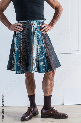 Slika na platnu man wearing a womans skirt