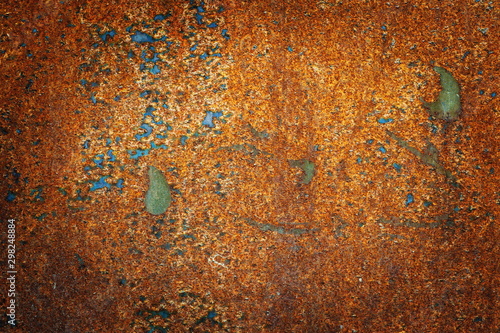 Fragment of an old rusty metal sheet