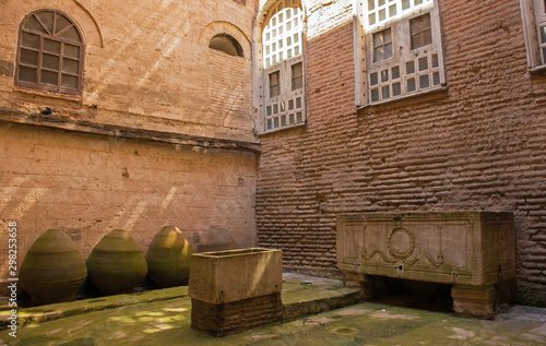 Courtyard of the Baptistery on the south west side of Hagia Sofia, or Ayasofia. Possibly dating from the 4th century, it was originally used for oil lamp storage before being used as a tomb.The large 