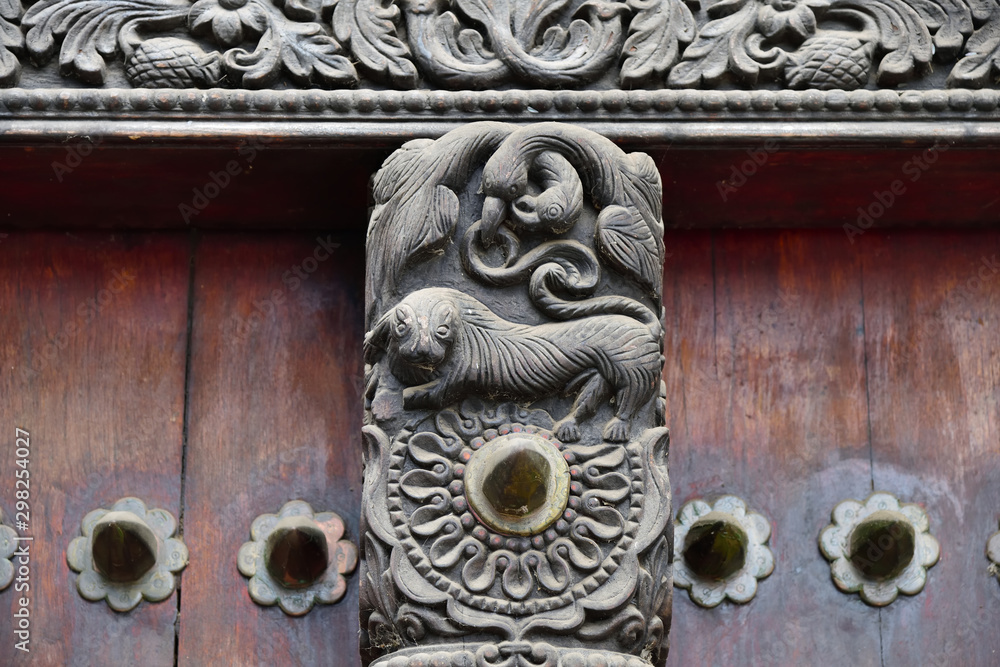 Traditional wooden carved door in Stone Town, Zanzibar, Tanzania, Africa Traditional wooden carved door in Stone Town, Zanzibar, Tanzania, Africa