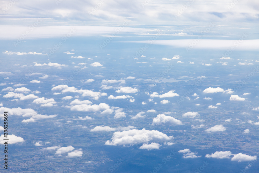 Clouds, sky and ground, looking from the plane. Clouds, sky and ground, looking from the plane.