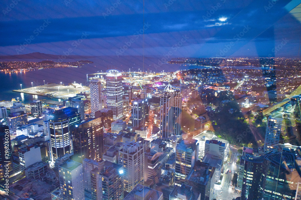 Amazing aerial view of Auckland skyline at night. City buildings and skyscrapers, New Zealand