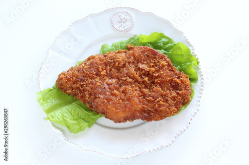 Japanese food, pork cutlet on lettuce with copy space