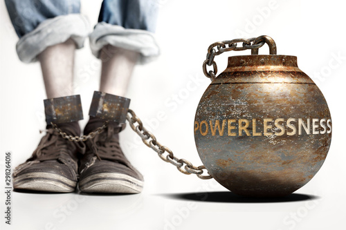 Powerlessness can be a big weight and a burden with negative influence - Powerlessness role and impact symbolized by a heavy prisoner's weight attached to a person, 3d illustration
