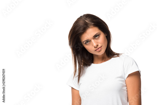 attractive young woman posing in white t-shirt, isolated on white © LIGHTFIELD STUDIOS