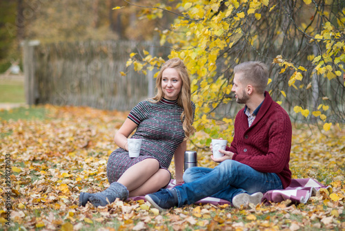 A portrait of young married couple expecting a baby