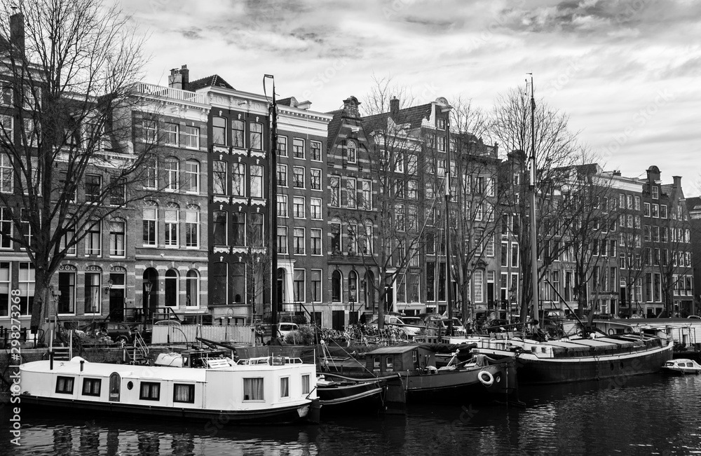 Amsterdam and boats in harbor