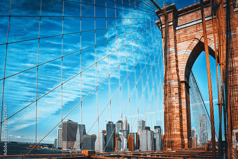 Fototapeta premium Lower Manhattan from Brooklyn Bridge which across the East Rive, between Manhattan and Brooklyn. New York.