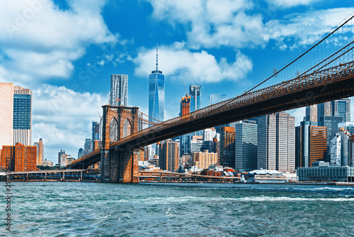 Suspended Brooklyn Bridge across Lower Manhattan and Brooklyn. New York, USA.