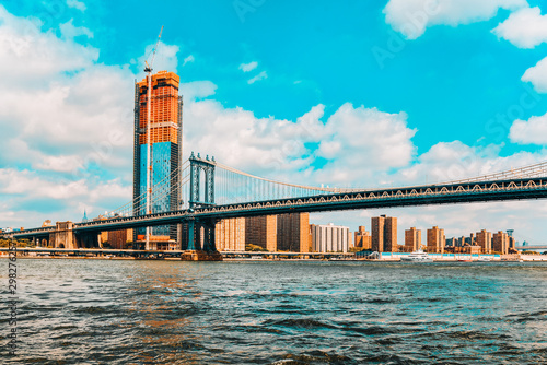 New York view of the Lower Manhattan and the Manhattan Bridge across the East River.