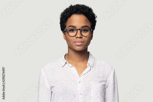 Head shot portrait beautiful young African American woman in glasses photo