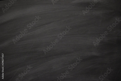 Abstract texture of chalk rubbed out on blackboard or chalkboard, concept for education, back to school, creatively, teaching , etc.