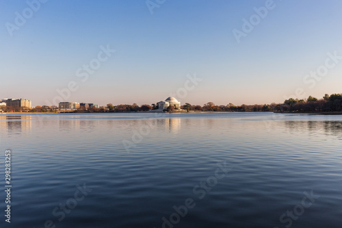 Thomas Jefferson Memorial with Tidal Basin lake in front during the sunset, Washington D.C.