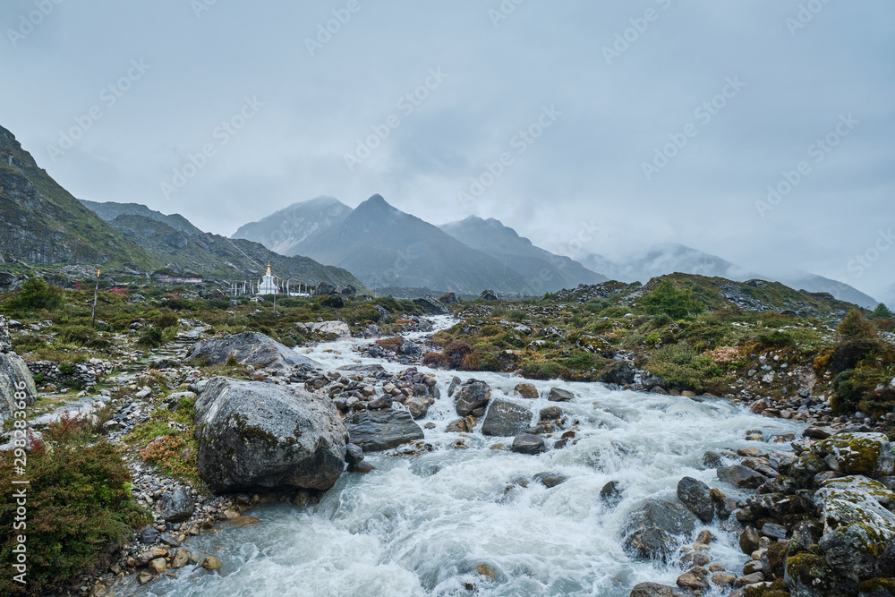 River in Langtang Valley with Stupa