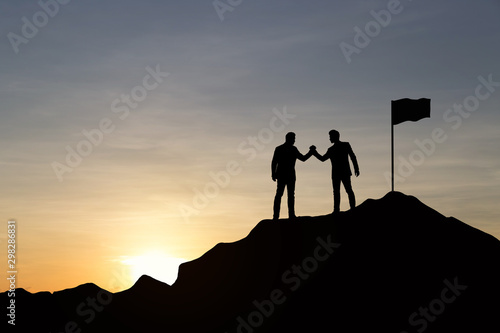 Silhouette of businessman are celebrating success at sunlight background. Business and goal concept.