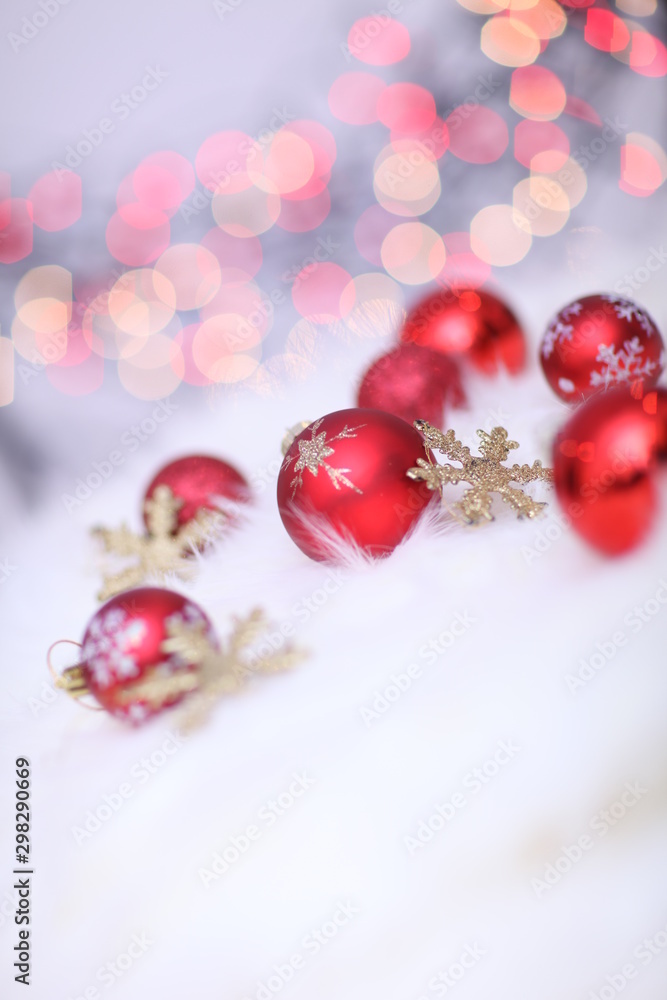 Beautiful christmas decorations are lying on white snow flakes. Beautiful christmas decorations are lying on white snow flakes.