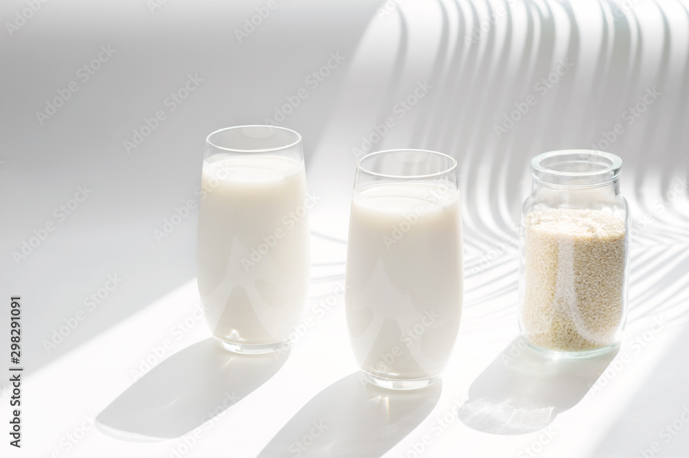Sesame seeds milk on the white background. Sesame seeds milk on the white background.