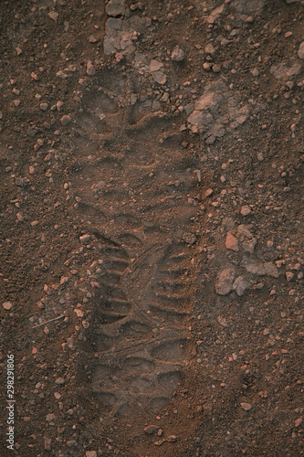 Fotografie Footprint on sand, as a clue in crime.