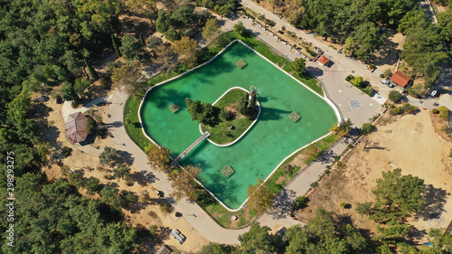 Aerial drone photo of famous Park of Filadelfia with small square pond, Athens, Attica, Greece