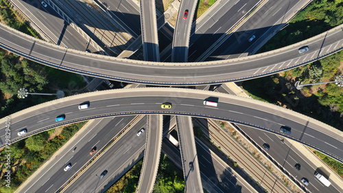 Canvas Print Aerial drone top down photo of urban multilevel highway junction with light traf