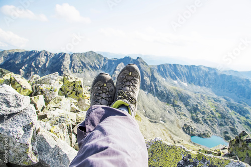 Hiker resting on top of the mountain