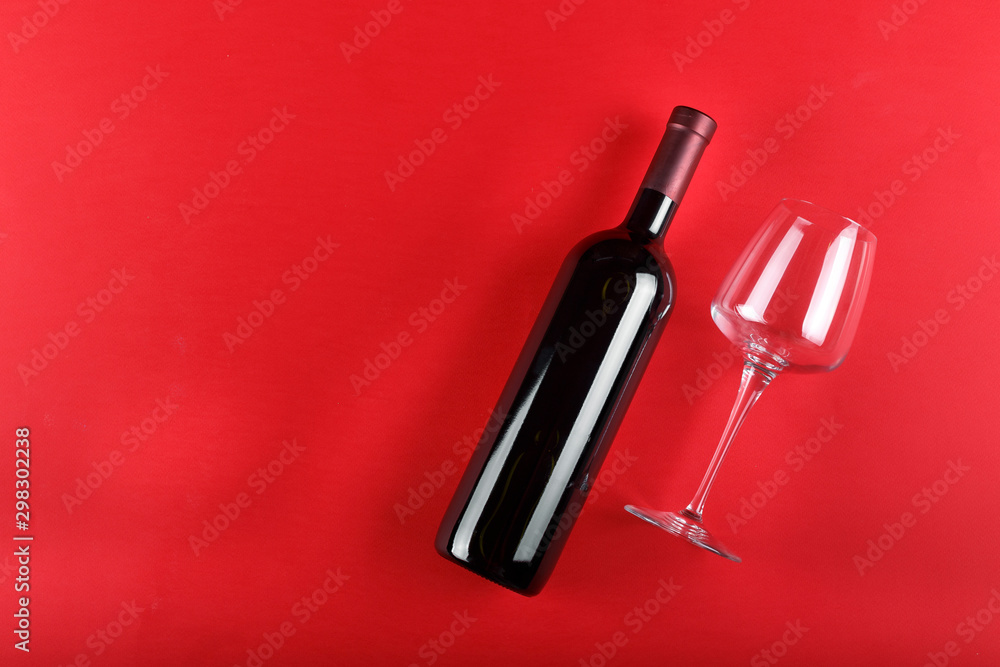 Fototapeta premium wine bottle and empty glass