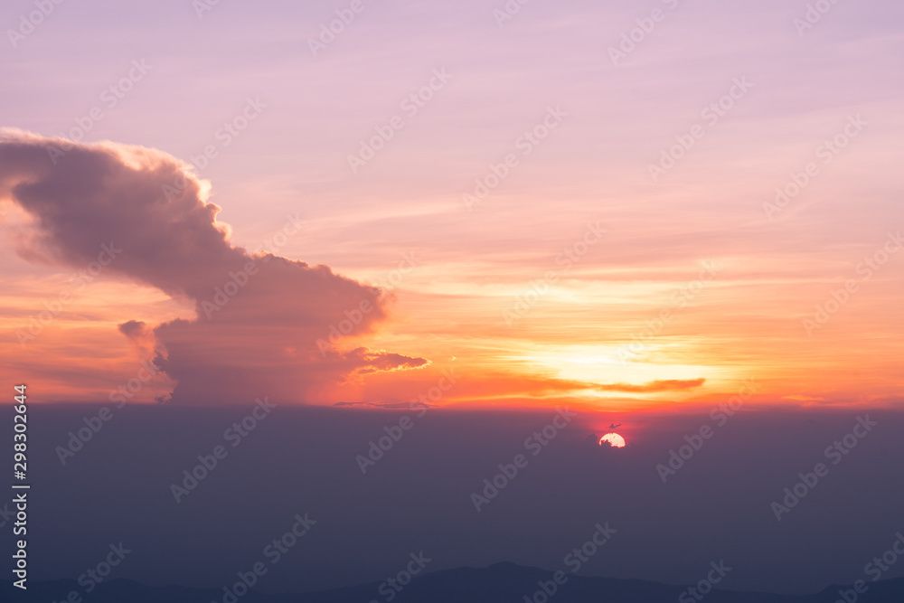 Colorful clear sky with the sun at sunset time, take photo from top of mountain in Thailand