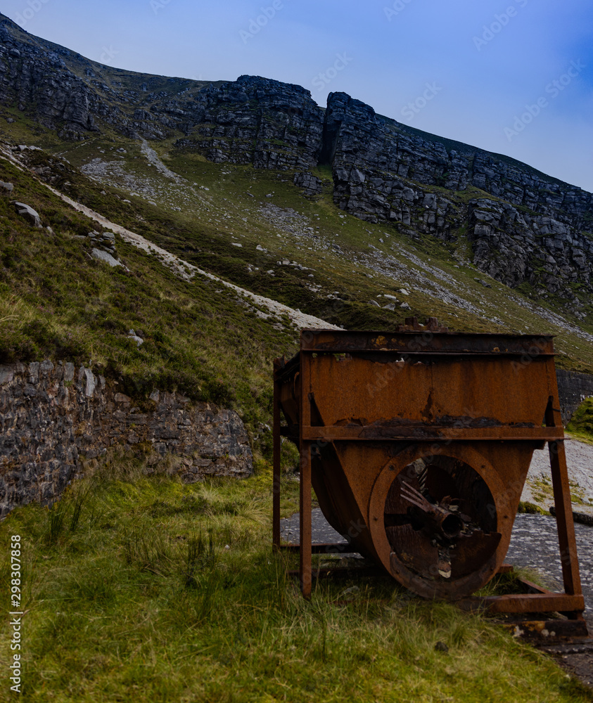 Obraz premium Old rusty mining machinery at Muckish Mountain, Gweedore, County Donegal, Ireland,