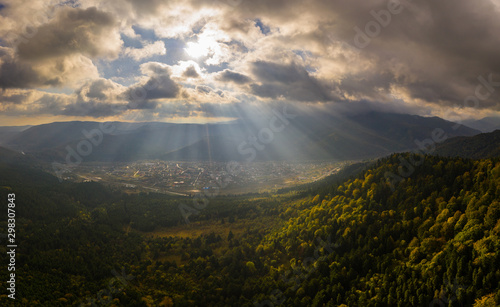 Beautiful Autmn forest shining at sunset. Flying above Colorful mountain flora © Dmytro Kosmenko