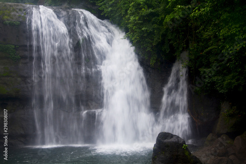 Waterfall of  the hills of Shillong in Meghalaya  silky blur water and natural surroundings with trees.