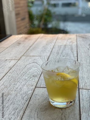 glass of water on wooden table