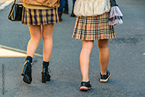 Teens with Skirts Walking at Street, Tokyo, Japan
