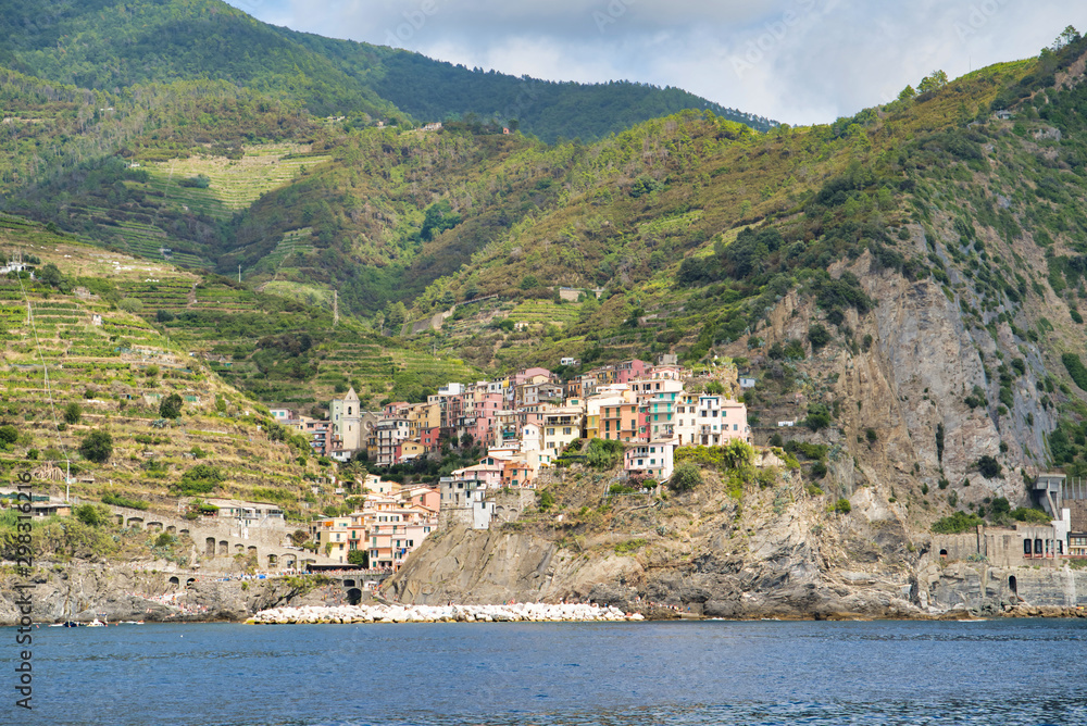 Picturesque village in the Ligurian province of La Spezia. Colorful houses on the coastal cliffs, Manarola, Italy